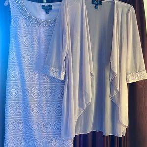 Beautiful beaded dress perfect for wedding, graduation or corporate event